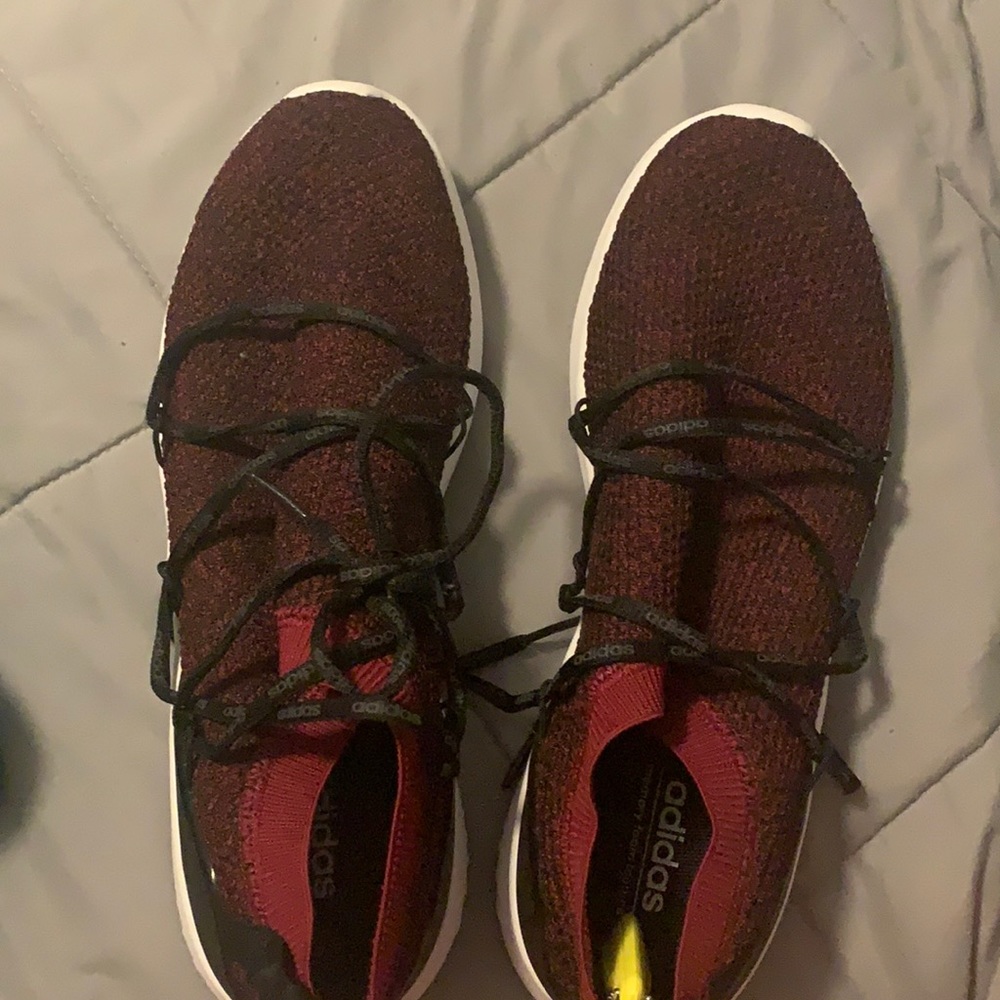 Red/burgundy. Never worn. 9.5.